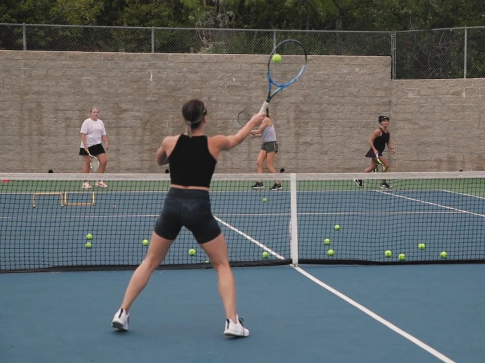 Structured coaching session at Laguna Beach Tennis Academy