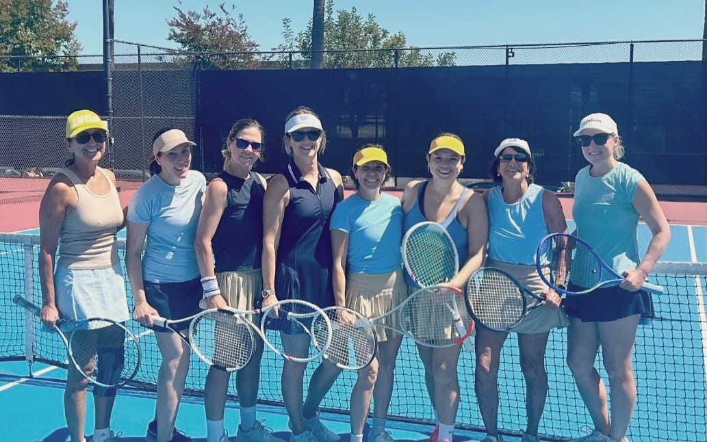 The LBTA women's team on court with their racquets